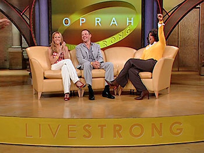 Oprah, Lance Armstrong and Sheryl Crow wear LIVESTRONG wristbands.