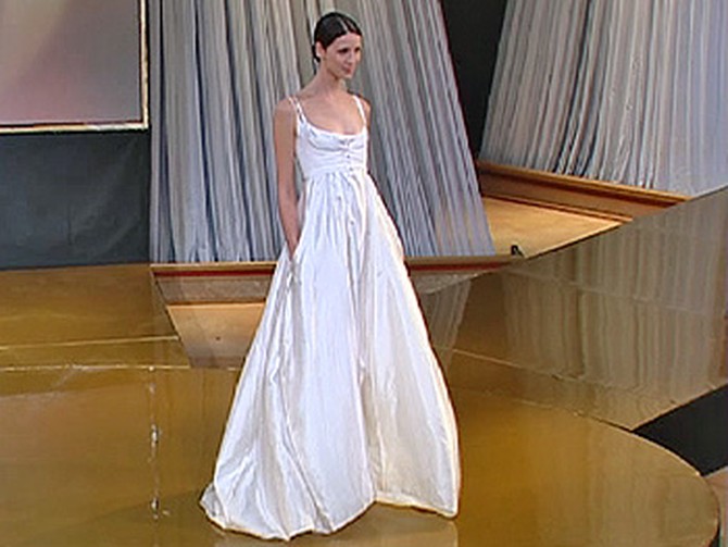 Caitriona models Narciso Rodriguez dress.