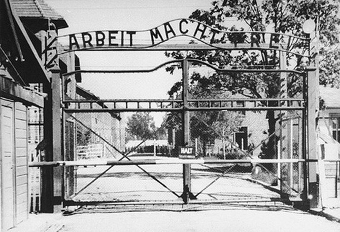 The gate at Auschwitz, photograph courtesy of the United States Holocaust Memorial Museum