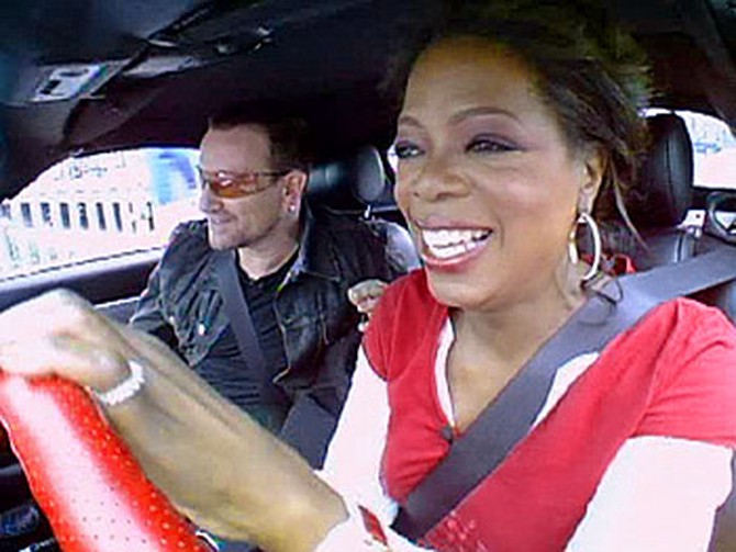 Oprah and Bono leave for their shopping trip