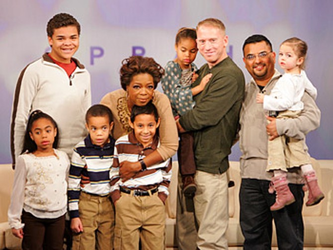Oprah meets Mark, Andy and their six adopted children.