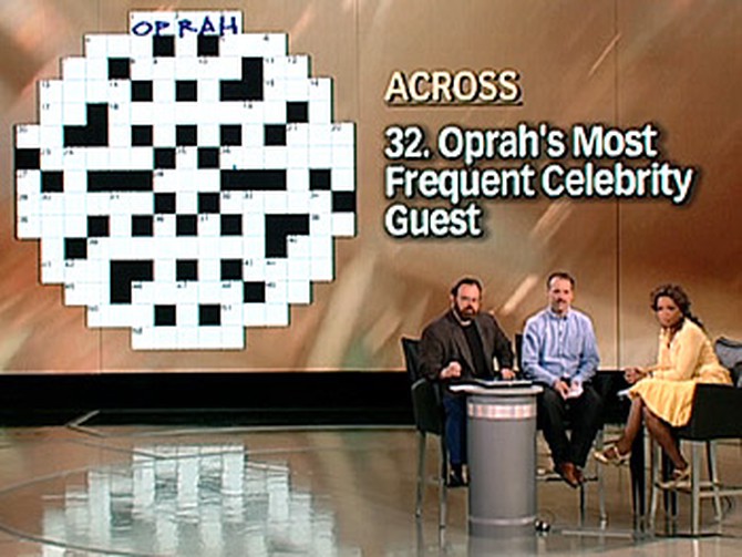 Merl Reagle, Will Shortz and Oprah fill out an 'Oprah' crossword puzzle.