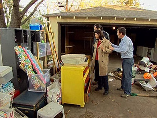 Janet and Charlton decide what to keep in their garage.