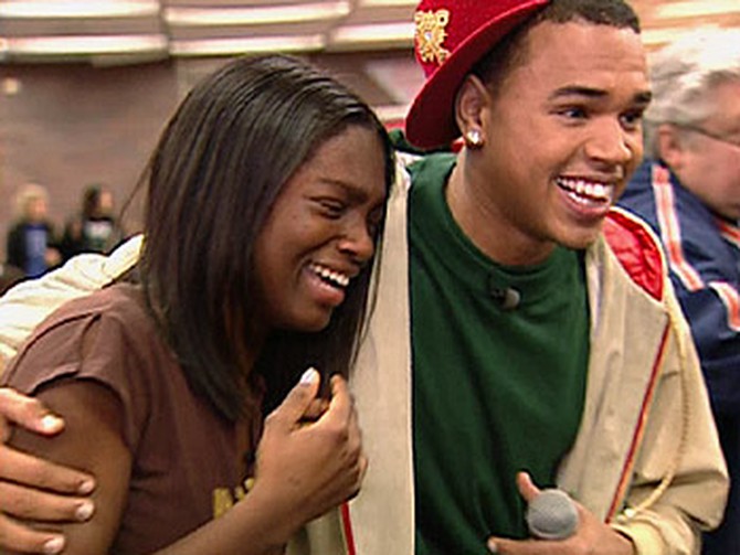 Chris Brown surprises Jamese at her school cafeteria.