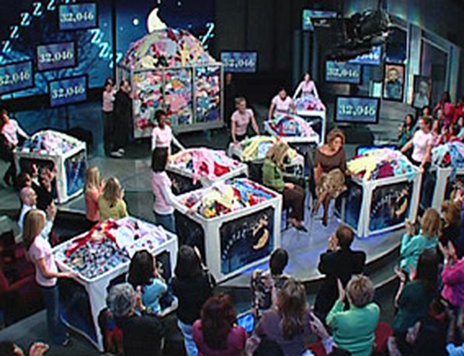 The audience collects 32,046 pairs of pajamas!