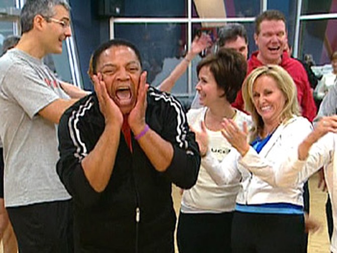 Reggie Wells in a laughing yoga class
