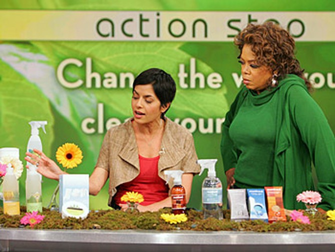 Simran shows Oprah organic cleaning options.
