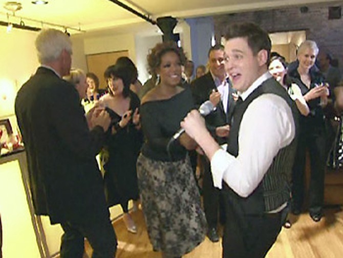 Michael Bublé dances with Oprah.