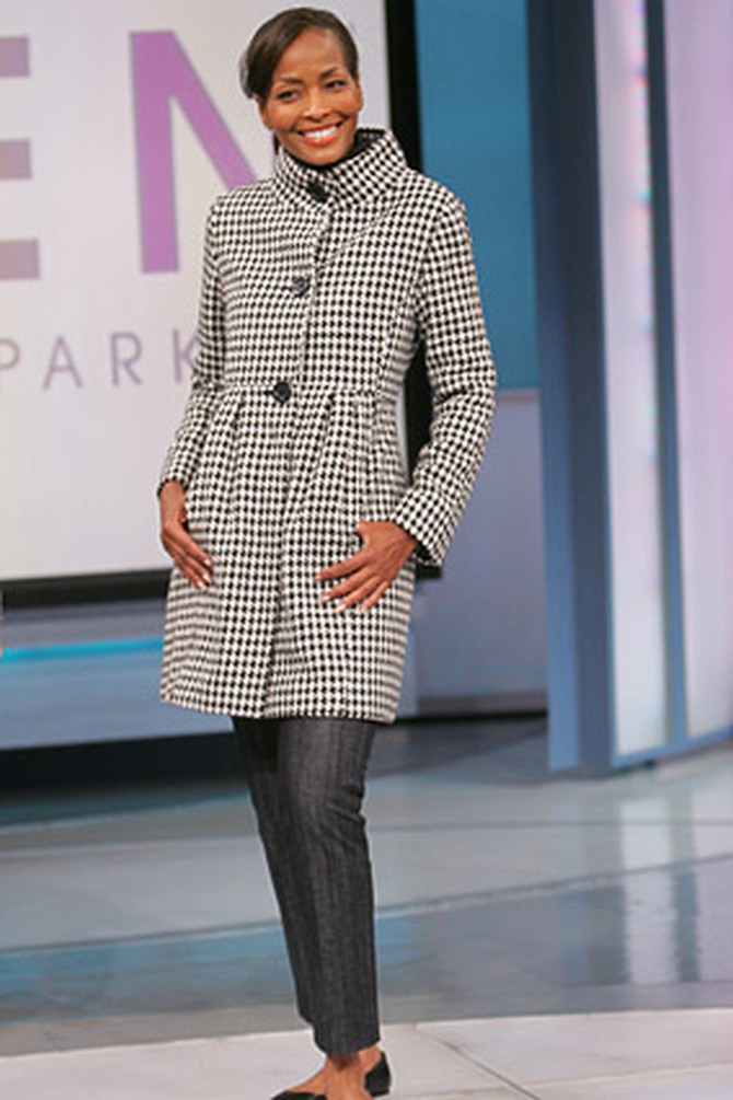 Thea is ready for fall in this houndstooth coat.