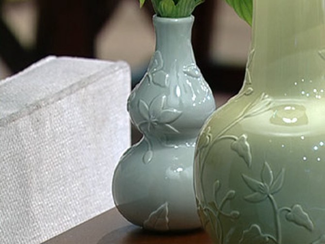 Victoria points out her Perfect Pieces vases.