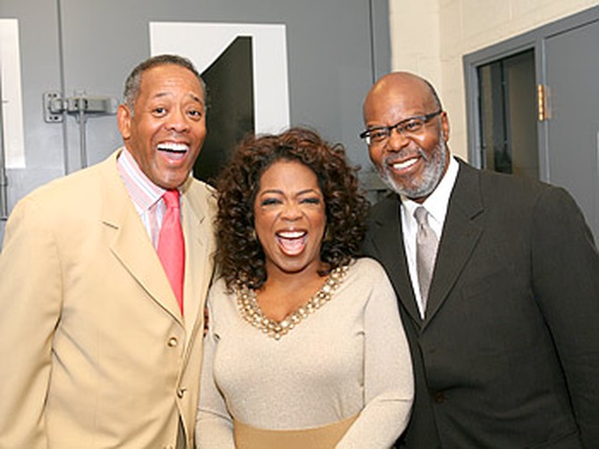 Oprah poses for a picture.