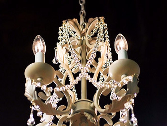 A chandelier hanging in the entrance