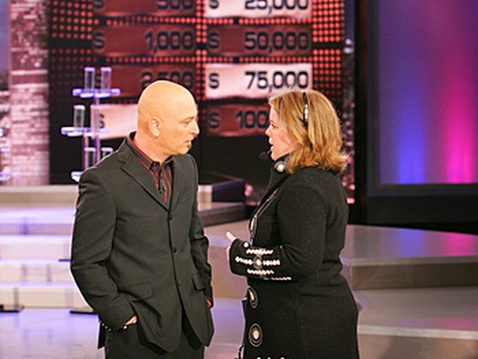 Howie Mandel chats with a crew member.