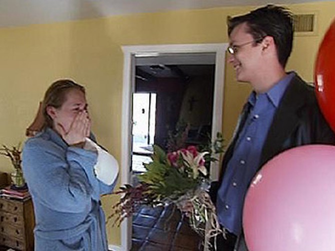 Tim surprises his wife, Carly, with Oprah Show tickets