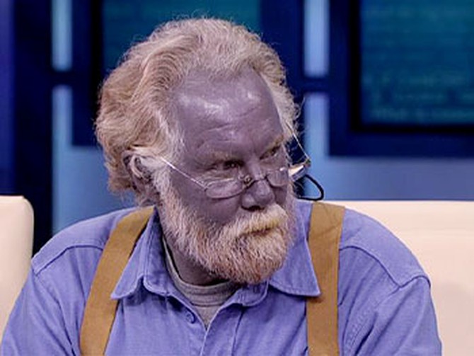 Paul is really blue, it's no makeup or lighting trick.
