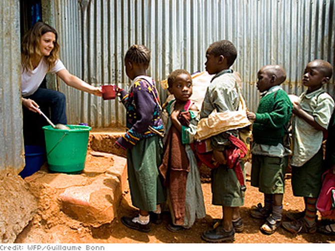 Drew Barrymore dishes out lunches in Nairobi, Kenya.