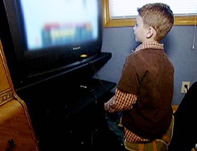 Tommy playing a video game