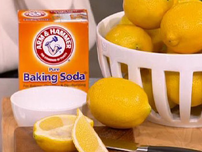 Clean kitchen surfaces with baking soda.