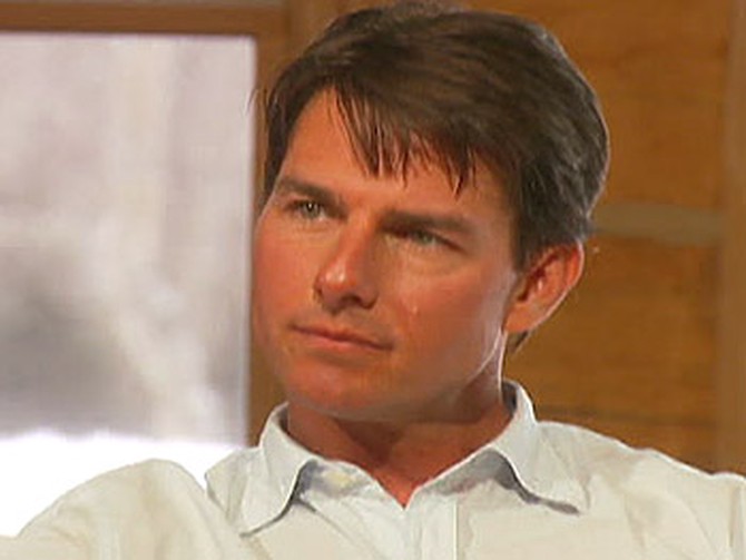 Tom Cruise talks about his wife's pregnancy.