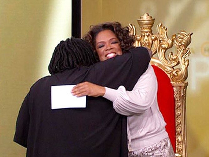 Princess Fannie gives Oprah a hug.