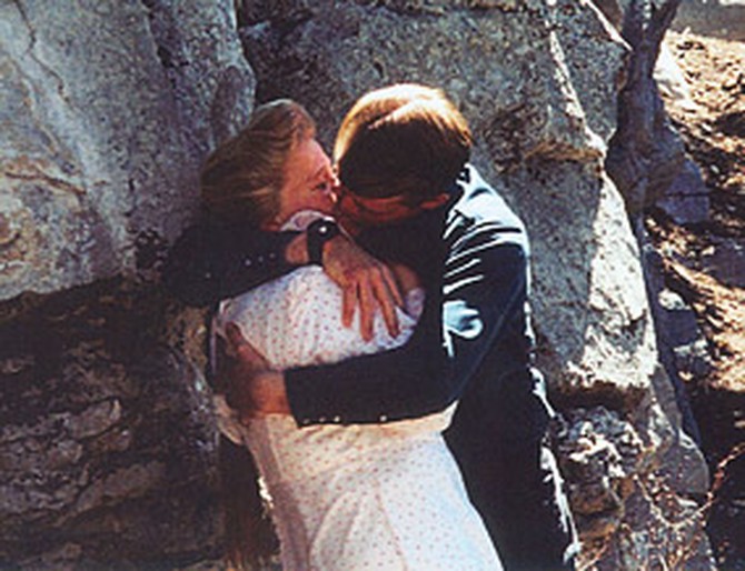 Elissa Wall's ex-husband forces a kiss.