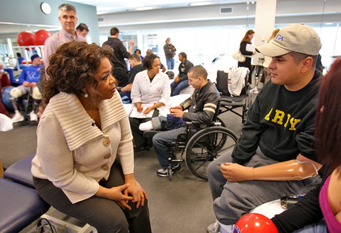 Staff Sgt. Ramon Padilla talks with Oprah.