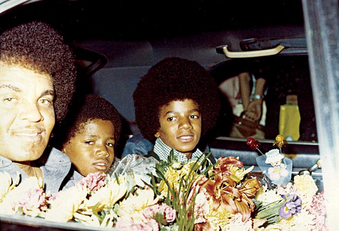 Michael and Randy Jackson in the car with Joe Jackson