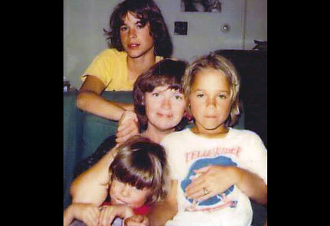 Rob, his mother, Barbara, and siblings, Chad and Micah, in 1978