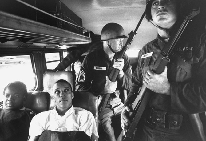 Freedom Riders on bus with police