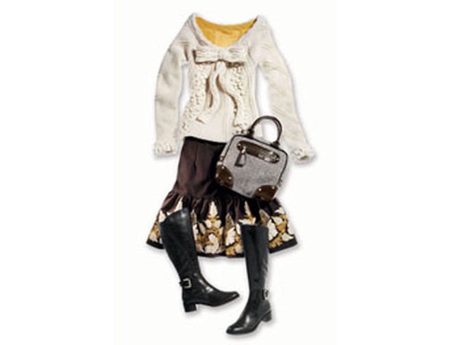 Full skirt, chunky knit, patent leather and tweed bag, marigold jersey, and riding boots